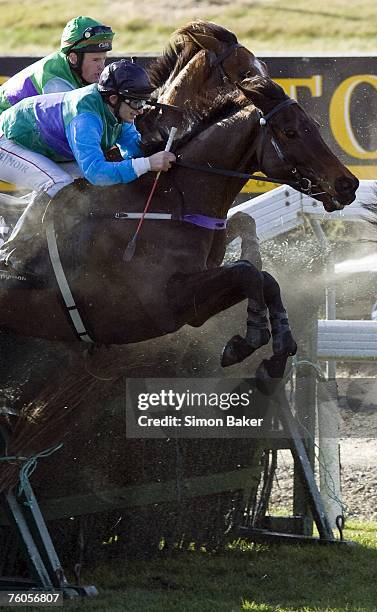 Stewart Moir on Lindisfarne with eventual winner Isaac Lupton on Gauchito behind during the Grand National Steeples at Riccarton on August 11, 2007...