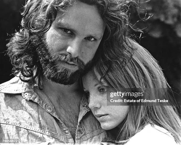 Singer Jim Morrison of The Doors with girlfriend Pamela Courson during a 1969 photo shoot at Bronson Caves in the Hollywood Hills, California.