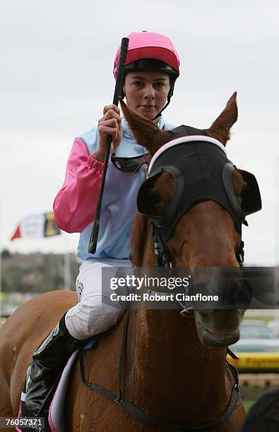 Sebastian Murphy jockey for Haddle McDaddle acknowledges his win after he won the Andrew Clarke and John Collins Handicap during the Aurie's Star...