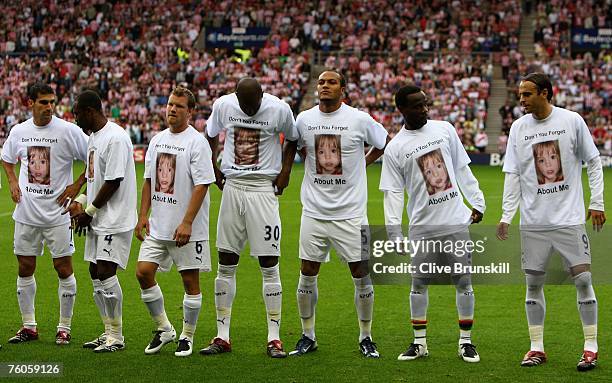 Tottenham Hotspur players line up in Madeleine McCann tee shirts prior to the Barclays Premier League match between Sunderland and Tottenham Hotspur...