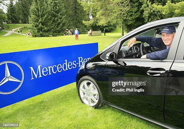 Tony Johnstone of Zimbabwe wins a Mercedes car for hole-in-one on the 17th hole during the second round of the Bad Ragaz PGA Seniors Open played at...