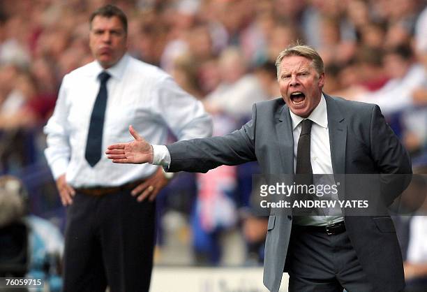 Sammy Lee , manager of Bolton Wanderers, shouts to his players watched by Sam Allardyce, manager of Newcastle United during a Premiership football...