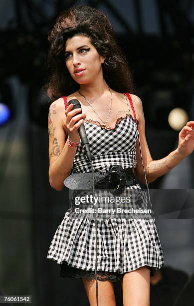 Amy Winehouse perform at Lollapalooza 2007 at Grant Park on August 5, 2007 in Chicago.