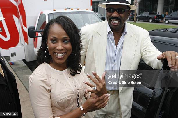 Steve Harvey and Majorie Bridge displaying her new wedding ring shortly after being interviewed by CNN anchor T.J. Holmes reporting from 2007 Essence...