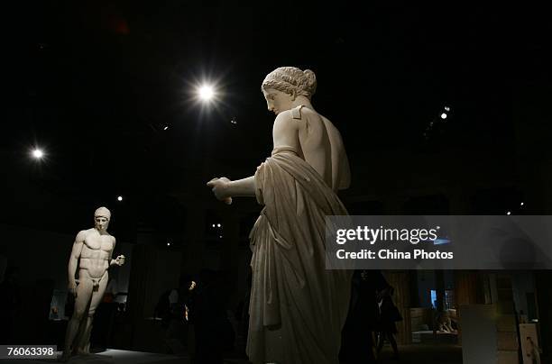 Sculptures of Aphrodite and Ares during an exhibition of ancient Greek art from the Louvre Museum on August 11, 2007 in Beijing, China. The Precious...
