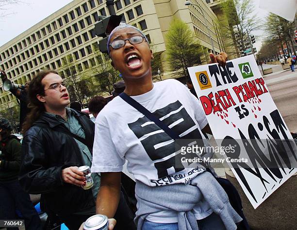 Howard University student Marpessa Andrews, joins fellow Amnesty International activists during a protest against capital punishment in front of the...