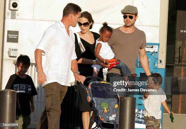 Brad Pitt and Angelina Jolie visit The Field Museum with their children on August 11, 2007 in Chicago.