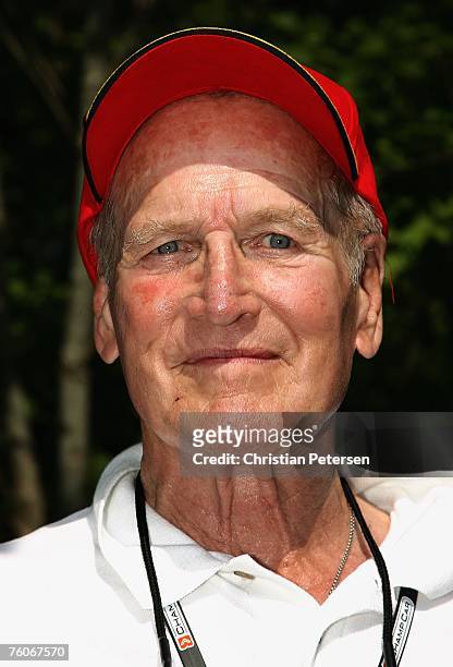 Actor Paul Newman looks on as his team Newman Haas Lanigan Racing celebrates their victory at the ChampCar World Series Generac Grand Prix at Road...