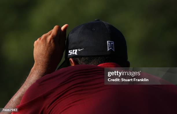 Tiger Woods lines up a putt on the 17th green during the final round of the 89th PGA Championship at the Southern Hills Country Club on August 12,...