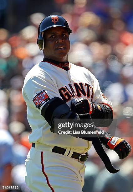 Barry Bonds of the San Francisco Giants looks on during the game against the Pittsburgh Pirates at AT&T Park August 12, 2007 in San Francisco,...