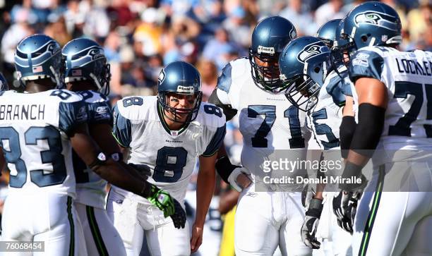 Starting Quarterback Matt Hasselbeck of the Seattle Seahawks calls the play in huddle with his teammates against the San Diego Chargers during the...