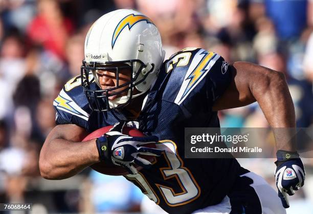 Runningback Michael Turner of the San Diego Chargers runs the ball against the Seattle Seahawks during their preseason 3NFL game on August 12, 2007...
