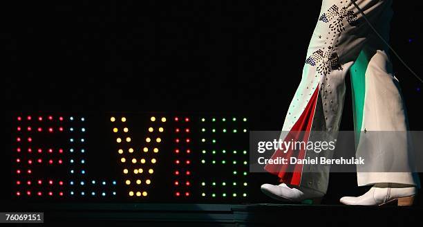 Elvis impersonator, only known as Elvis, performs on stage during the Return of the Kings, Elvis tribute show at the Palladium on Agust 12, 2007 in...