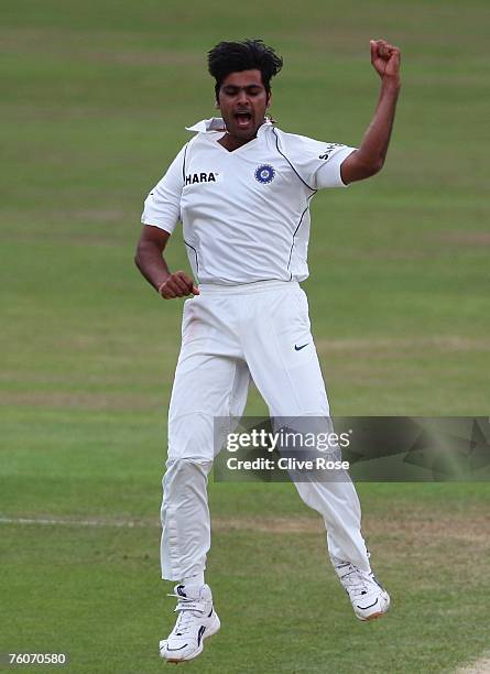 Rudra Pratap Singh of India celebrates the wicket of Andrew Strauss of England during day five of the Third Test match between England and India at...
