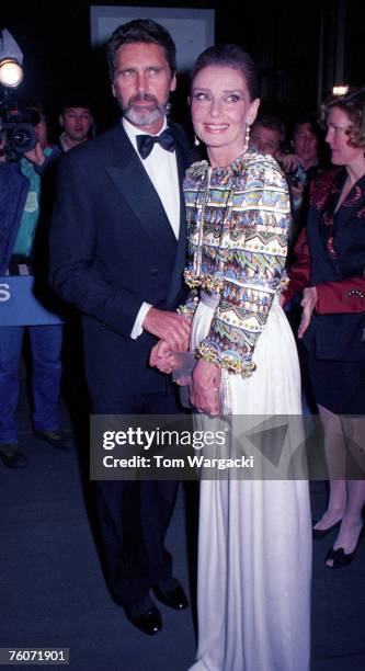 Audrey Hepburn and Robert Wolders arrive for the Lincoln Center Tribute on April 23, 1992 in New York City.