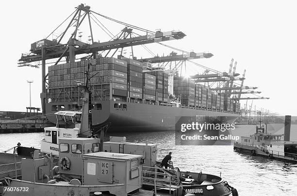 Container ship from China is unloaded at the main container port August 13, 2007 in Hamburg, Germany. Northern Germany, with its busy ports of...