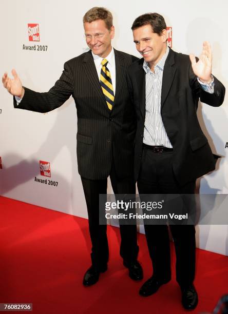 Politician Guido Westerwelle and his partner businessman Michael Mronz attend the Sport Bild Award 2007 at the Elb Lounge on August 13, 2007 in...