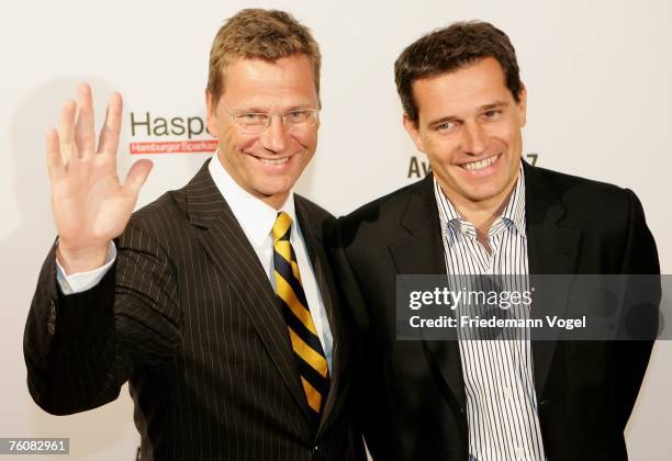 Politician Guido Westerwelle and his partner businessman Michael Mronz attends the Sport Bild Award 2007 at the Elb Lounge August 13, 2007 in...