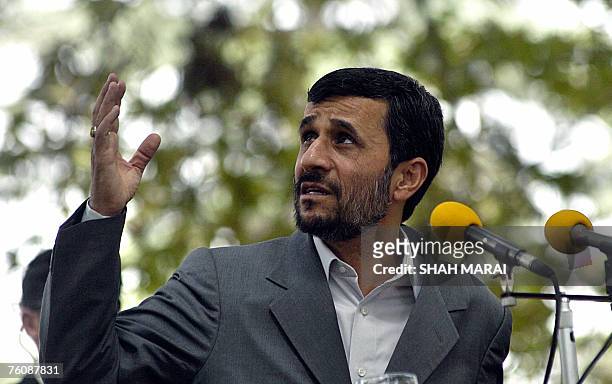 Visiting Iranian President Mahmoud Ahmadinejad addersses during a press conference at the Presidential palace in Kabul, 14 August 2007. Ahmadinejad...