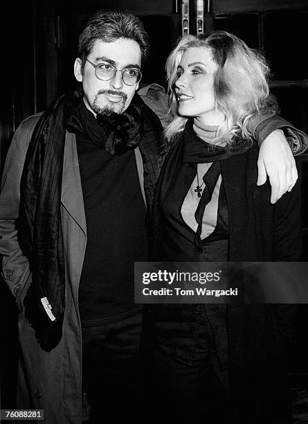 Debbie Harry and Chris Stein leave Langan's Brasserie on July 15, 1987 in London.