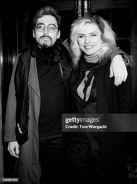 Debbie Harry and Chris Stein leave Langan's Brasserie on July 15, 1987 in London.