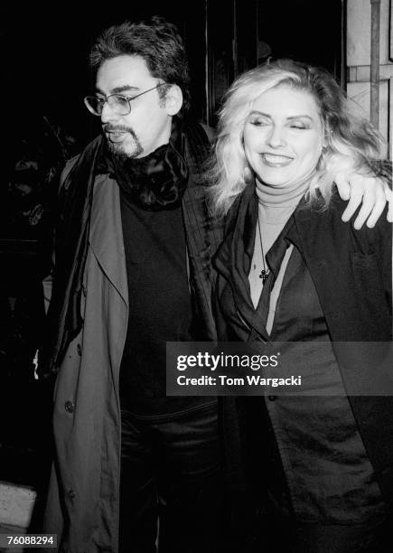 Debbie Harry and Chris Stein leave Langan's Brasserie on July 15, 1987 in London.