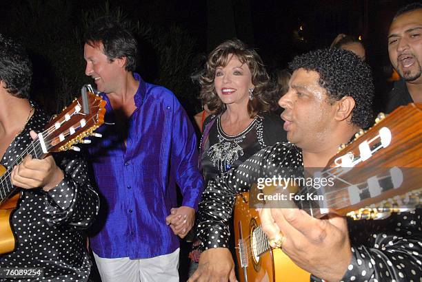 Percy Gibson, Joan Collins and Rico From the Gypsies King Legend Band Attend The Monika Bacardi and Massimo Gargia's Birthday Party at The Byblos...