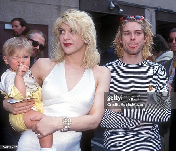 Kurt Cobain of Nirvana with wife Courtney Love and daughter Frances Bean Cobain