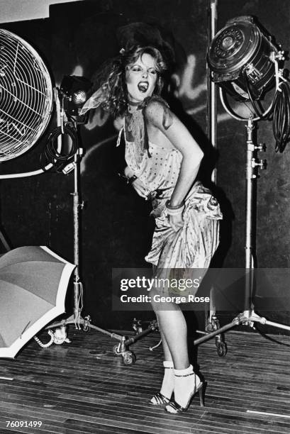 Fashion model performs in a mock fight during a punk fashion show at Fiorucci clothing store in 1979 Beverly Hills, California.