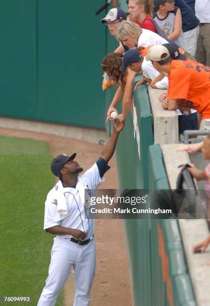 Fernando Rodney of the Detroit Tigers signs an autograph after the game against the Tampa Bay Devil Rays at Comerica Park in Detroit, Michigan on...