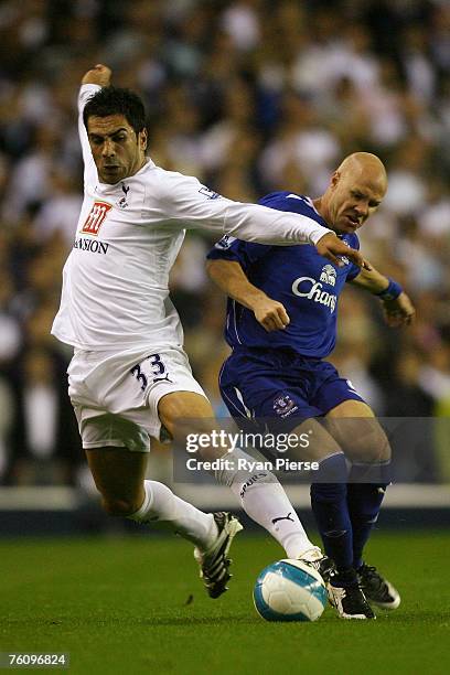 Ricardo Rocha of Tottenham and Andy Johnson of Everton battle for the ball during the Barclays Premiership match between Tottenham Hotspur and...