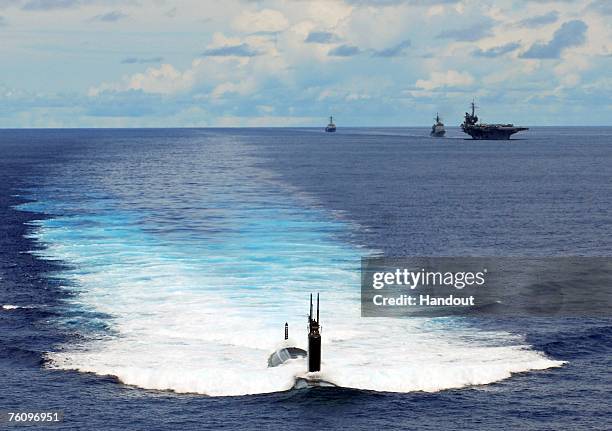 Uss Simuran At Sea Aboard The Uss Kitty Hawk Photos and Premium High Res Pictures ...