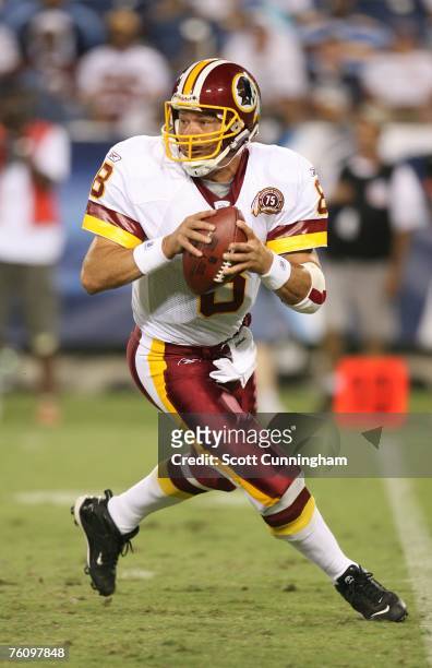 Mark Brunell of the Washington Redskins scrambles against the Tennessee Titans at LP Field on August 11, 2007 in Nashville, Tennessee. The Redskins...