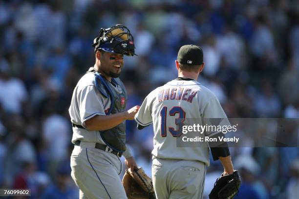 Billy Wagner of the New York Mets celebrates win with Ramon Castro after the game against the Chicago Cubs at Wrigley Field in Chicago, Illinois on...