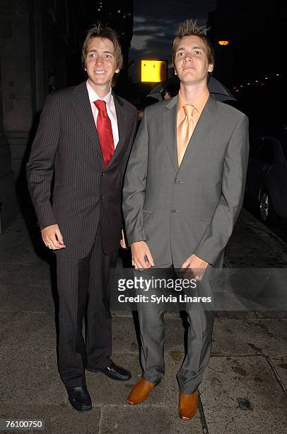 Oliver Phelps and James Phelps arrive at the after party of the premiere of "Harry Potter and the Order of the Phoenix" at Old Billingsgate in London...