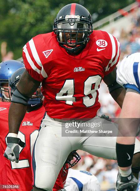 Ole Miss All-American linebacker Patrick Willis celebrates after laying a big hit on Memphis running back Joseph Doss at Vaught-Hemingway Stadium on...