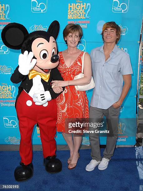 Mickey Mouse, President Disney/ ABC Television Group Anne Sweeney and actor Zac Efron arrive at the premiere of "High School Musical 2" at the...