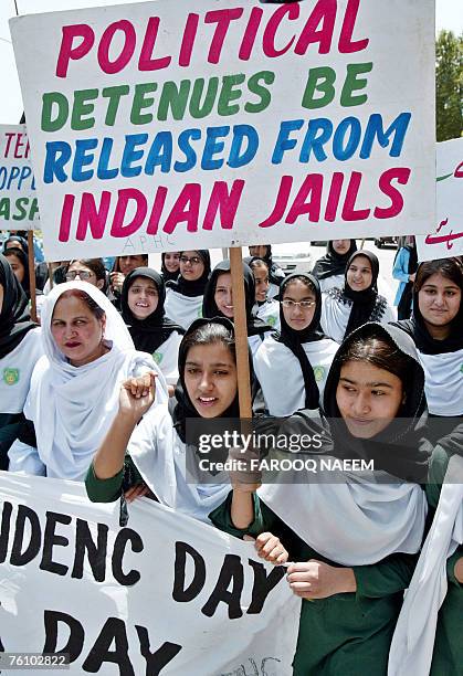 Students from Pakistani controlled Kashmir march towards the Indian embassy in Islamabad, 15 August 2007. The protestors condemned Indian forces'...