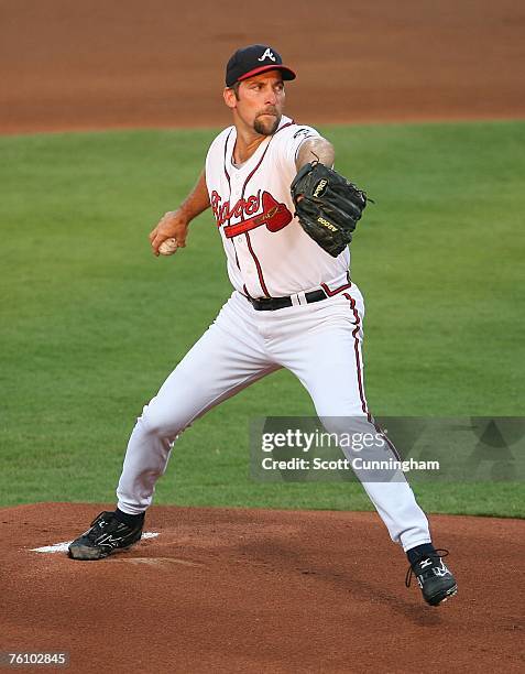 John Smoltz of the Atlanta Braves pitches against the San Francisco Giants at Turner Field on August 14, 2007 in Atlanta, Georgia. The Braves...