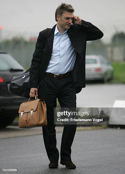 Dietmar Beiersdorfer looks on during the Hamburger SV departure at the Hamburg Airport on August 15, 2007 in Hamburg, Germany.