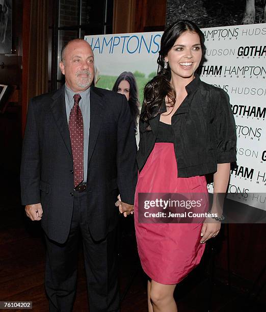 Celebrity chef and Media Personality Katie Lee Joel poses with Musician and Husband Billy Joel at the Gotham And Hamptons Magazines Celebration for...