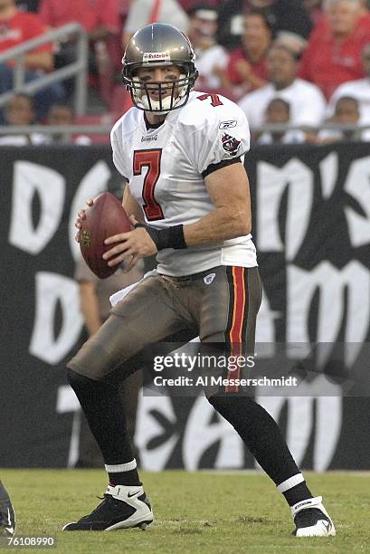 Quarterback Jeff Garcia of the Tampa Bay Buccaneers sets to pass the ball against the New England Patriots at Raymond James Stadium on August 10,...