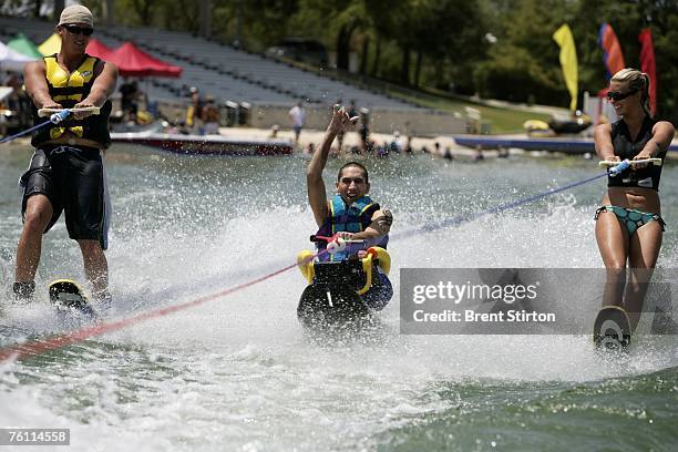 Josh Stein is pictured learning to waterski, part of a program run by local NGO "Warm Springs" They run an adaptive ski program for people with...