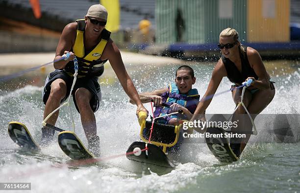 Josh Stein is pictured learning to waterski, part of a program run by local NGO "Warm Springs" They run an adaptive ski program for people with...