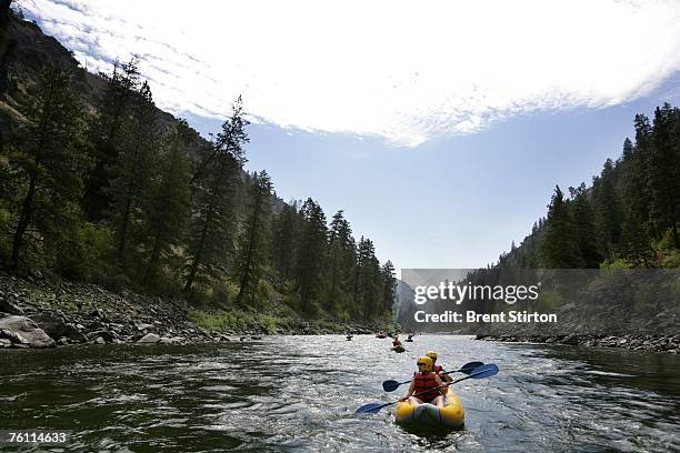 Staff Segeant Damion Jacobs, 30 and his wife Shannon Jacobs drift down the Main Salmon River on a 4 day river rafting trip August 14, 2006 in Salmon...