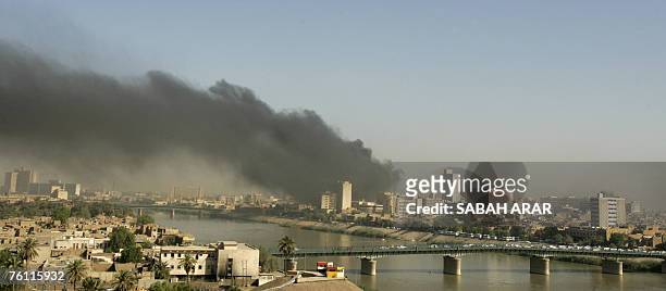 Smoke rises from the site of an explosion in central Baghdad, 16 August 2007. A car bomb exploded in a popular Baghdad shopping complex today,...