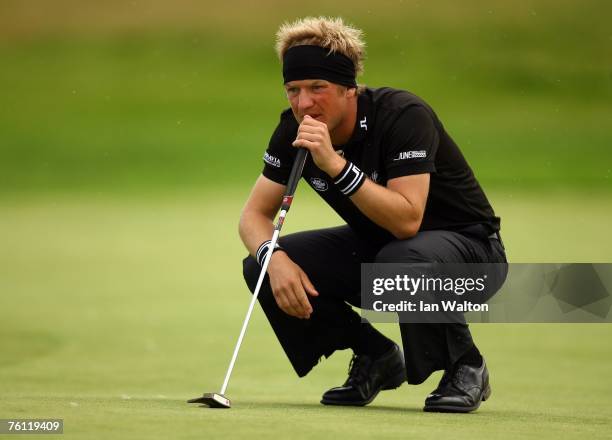 Pelle Edberg of sweden lines up a put on the 9th hole during the 1st round of the Scandinavian Masters 2007 at the Arlandastad Golf Club on August...