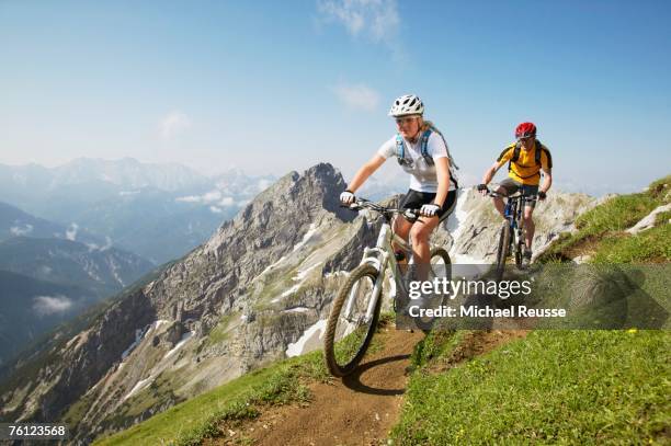 mountain biking - karwendel mountains stockfoto's en -beelden