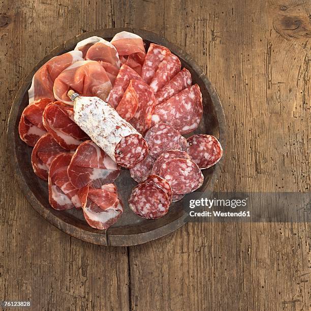 sliced salami and ham on plate, elevated view - ham salami stock pictures, royalty-free photos & images