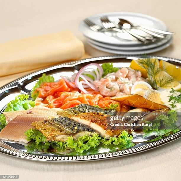 various fish on plate - filleted stock pictures, royalty-free photos & images